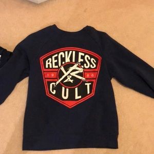 Young and Reckless sweater